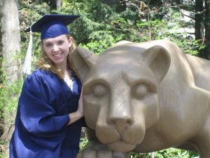 Denise Gardner with Nitney Lion Statue
