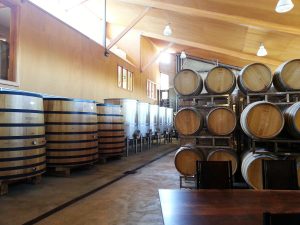 penner ash wine barrels in cellar